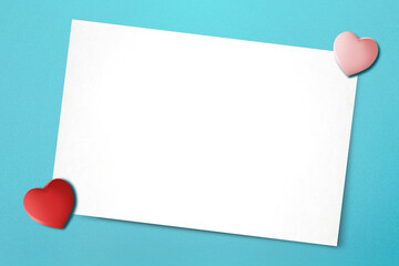 Empty white paper and heart with a colored background