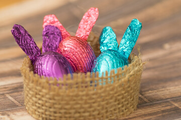Easter Bunny Image, Shiny Easter Egg Chocolate on the Wooden Table
