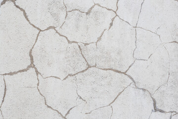 An old wall with cracks. Background image.