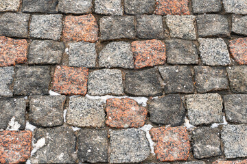 Gray and red stone paving slabs, stone background, paving stone pattern