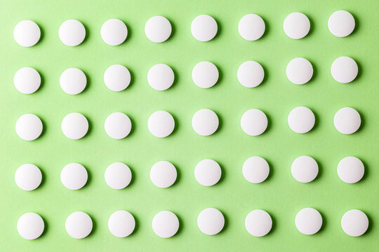 Image of a drug, pill, or treatment. At the green surface layer.