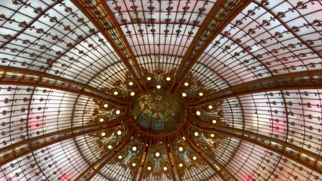 Ornate domed roof of famous Galeries la Fayette mall in Paris France