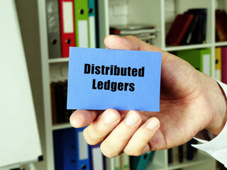  Distributed Ledgers inscription on the blue business card.