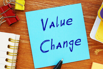 Business concept meaning Value Change with phrase on the piece of paper.