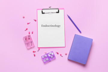 Clipboard with word ENDOCRINOLOGY and pills on color background