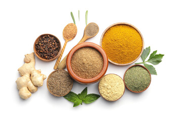 Different spices and herbs on white background