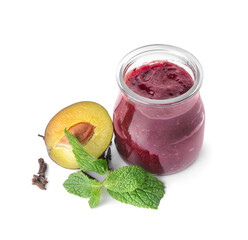 Glass jar with delicious homemade plum jam on white background