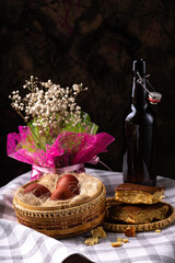 Easter still life. Eggs in a wicker basket. Christian holiday and food.