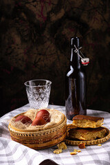 Easter still life. Eggs in a wicker basket. Christian holiday and food.