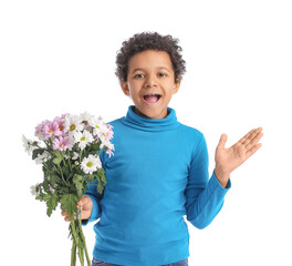 African-American boy with bouquet of beautiful flowers on white background
