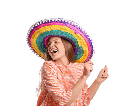 Dancing young Mexican woman in sombrero hat on white background