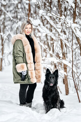 Beautiful woman play with a dog,