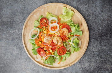 Top view vegetables salad with shrimps.