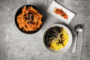 Top view jajangmyeon is Korean noodle with black bean sauce and Korean kimchi fried rice.