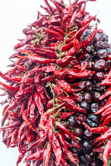 Fototapeta premium Dried red chili paprika hang in bunch.
