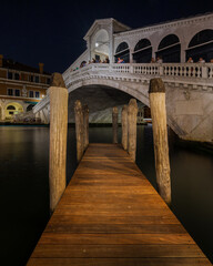 Night view of Rialto Bridge, one of the most popular landmarks in Venice, Italy