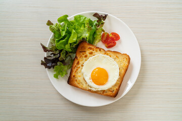 bread toasted with cheese and fried egg