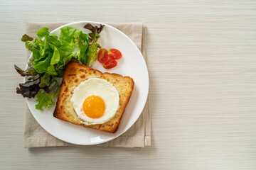 bread toasted with cheese and fried egg