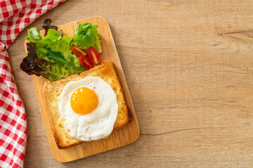 bread toasted with cheese and fried egg