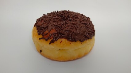 A donut with chocolate toping
