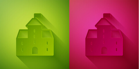 Paper cut Castle icon isolated on green and pink background. Medieval fortress with a tower. Protection from enemies. Reliability and defense of the city. Paper art style. Vector.