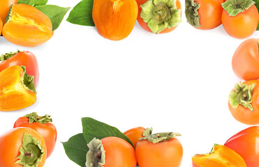 Frame of delicious fresh ripe persimmons on white background, top view. Space for text