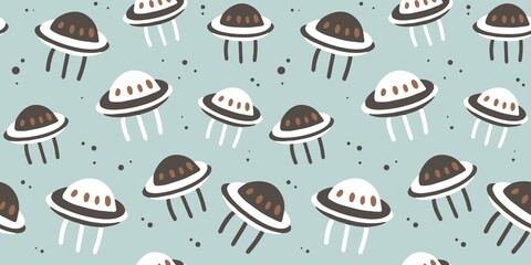 Trendy seamless space patterns. Ufo in cosmos backgrounds for cosmonautics day. Endless texture of universe for wallpaper, wrapping paper