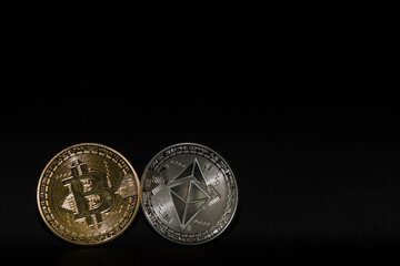 single bitcoin and ether coin with black background left