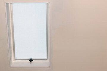 White Tinted Window in a White Wall