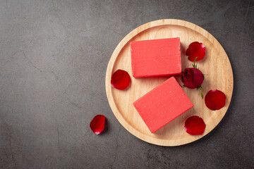 Rose handmade soap on dark background