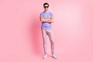 Full body photo of young cheerful man happy positive smile folded hands isolated over pastel color background