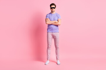 Fototapeta premium Full body photo of young handsome man confident serious crossed hands isolated over pastel color background