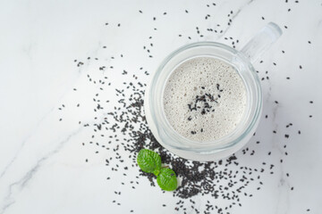 Soy milk mix black sesame on marble background