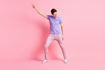 Fototapeta na wymiar Full body photo of young excited man happy positive have fun dance party isolated over pastel color background
