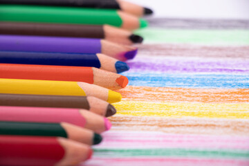 colored pencils and painted paper