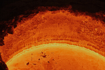 liquid molten steel in a bright red tank, similar to lava