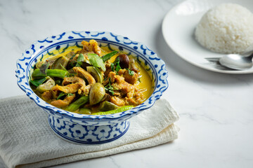 Thai food chicken green curry on marble background