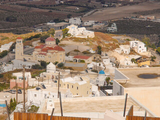 View of the central historical part of Pyrgos town on Santorini island, Greece.
