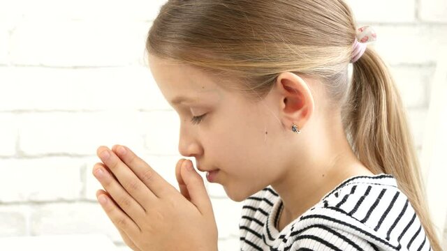 Kid Praying Before Eating Breakfast in Kitchen, Child Preparing to Eat Meal, Christian Girl Religious View at Home