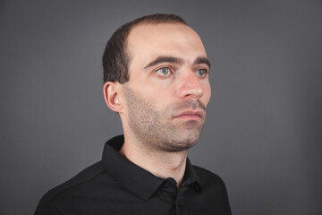 Obraz premium Portrait of caucasian man looking to the side.