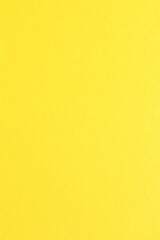 Yellow color paper background with simple surface.