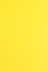 Yellow color paper background with simple surface.