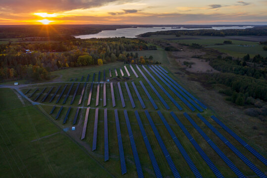 Aerial view of solar farm at sunset