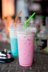 Variety of milk tea in tall glasses