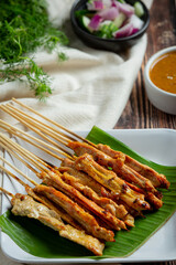 Pork satay with peanut sauce or sweet and sour sauce, Thai food
