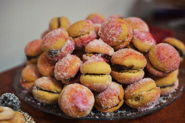 Closeup of peach-shaped cookies on plate