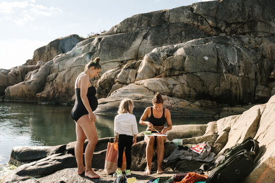 Family relaxing at sea