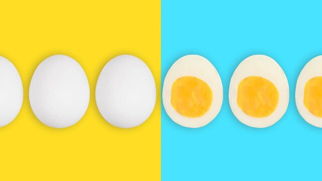 White boiled easter eggs move from yellow background to blue and become cut
