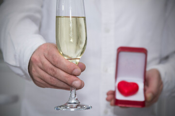 celebration of February 14 Valentine's Day with champagne and heart in hand