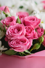 Bouquet of pink roses and white chrysanthemums. Celebration concept for birthday. mothers day. valentines day. Selective focus